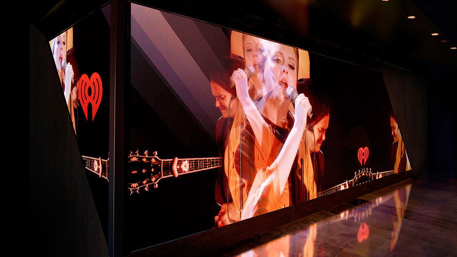 media wall showing live video effects on a music concert